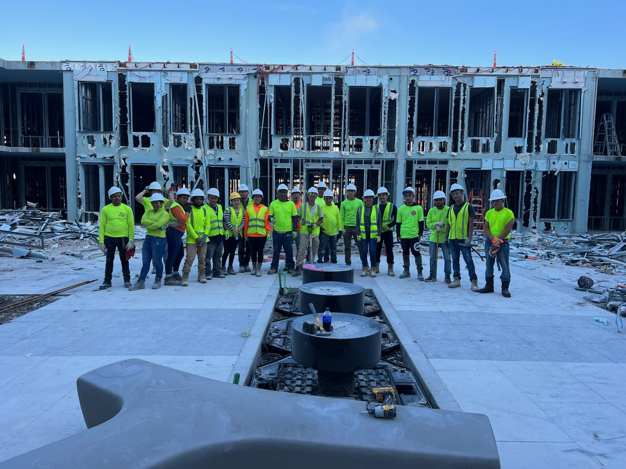 Level Demolition crew and owner team photo on a Jacksonville job site
